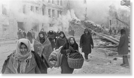 Leningradians leaving their houses destroyed by Nazi bombings