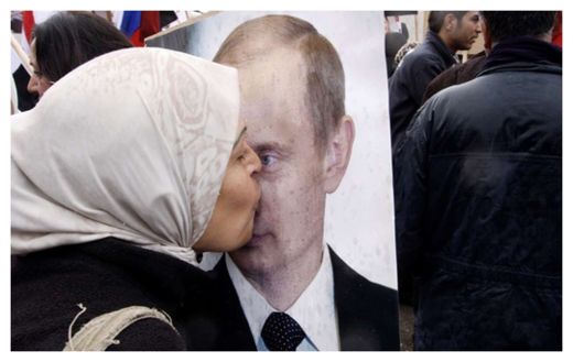 A woman kissing Putin photo