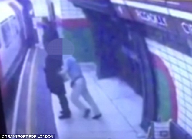 Muslim woman pushed into speeding train
