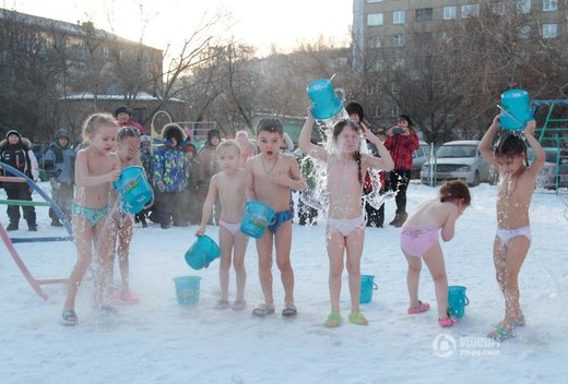 Russian children taking cold bath
