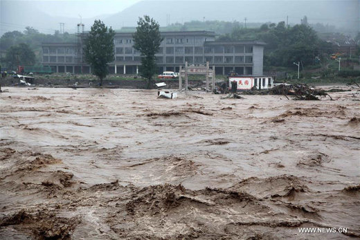 Photo taken on July 20, 2016 shows floods in Jingxing County of Shijiazhuang City, north China's Hebei Province