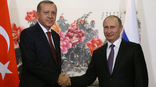 Turkish President Tayyip Erdogan (L) meets with Russian counterpart Vladimir Putin