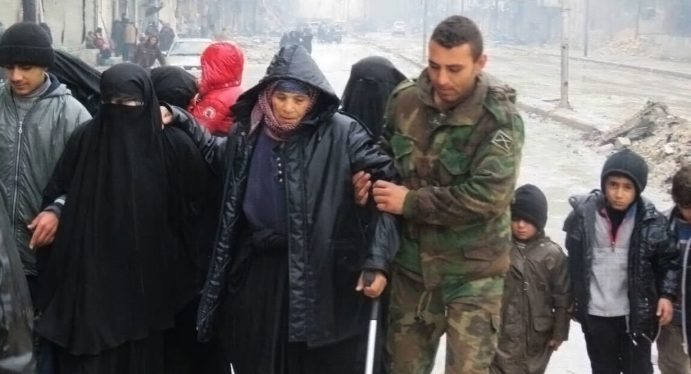 Syria soldier helping civilians