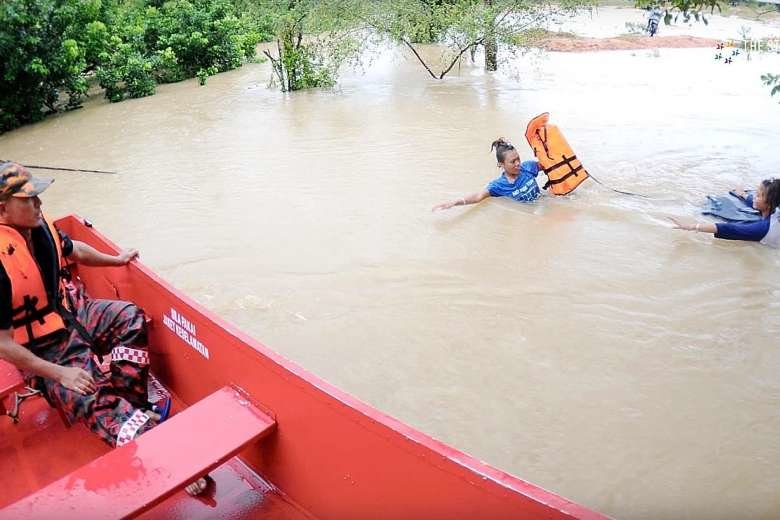 The floods in Malaysia's east coast, which some describe as the worst in 30 years, forcing the evacuation of thousands in Terengganu and Kelantan.