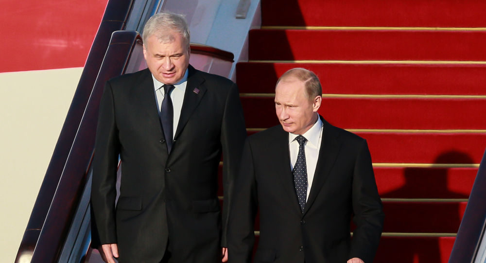 Putin and Russian Ambassador to China Andrei Denisov