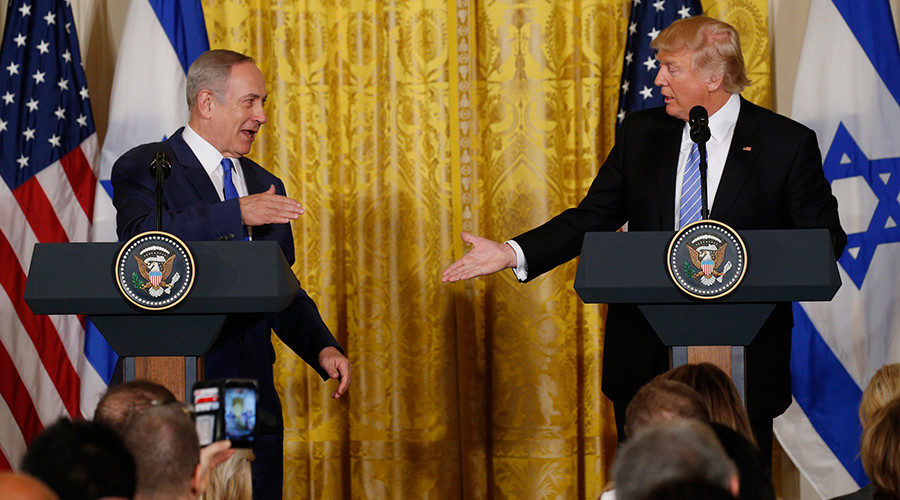U.S. President Donald Trump (R) greets Israeli Prime Minister Benjamin Netanyahu 