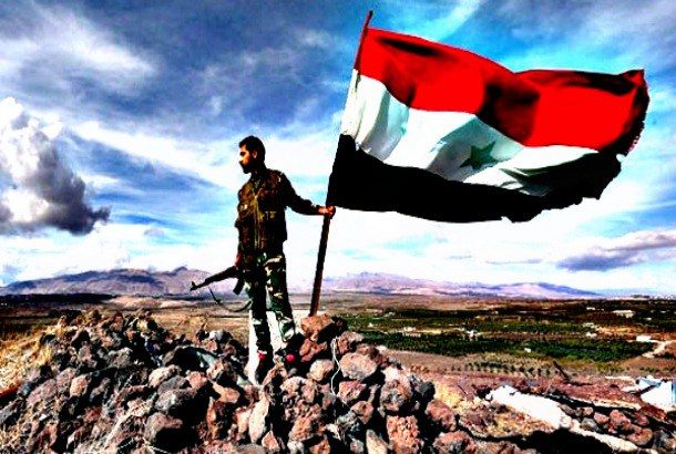 Syrian soldier with flag