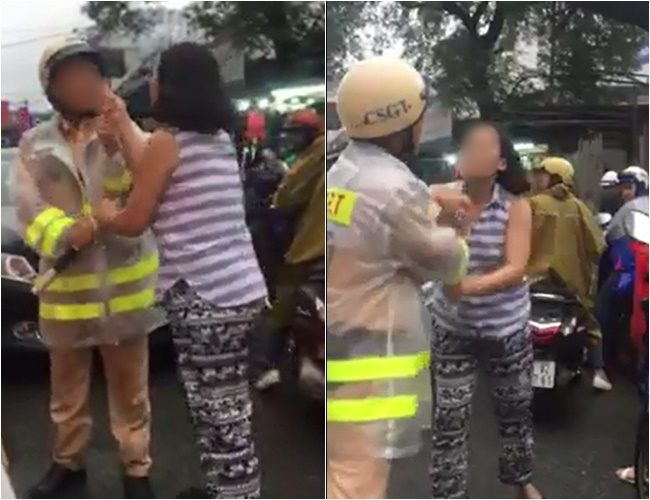 Woman assaulting Vietnamese traffic policeman