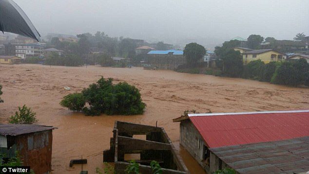 Homes were swept away in Regent, in the outskirts of Freetown, while roads turned into rampaging rivers as the mudslide struck