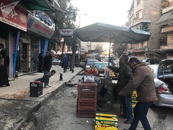 Citizens in Midan district in Aleppo, Syria