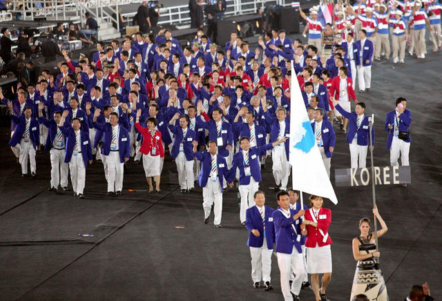North South Korea delegates marched under common flag at Olympic Athens 2004