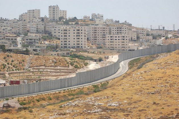 Shuafat refugee camp separation wall Israeli settlement Pisgat Ze'ev