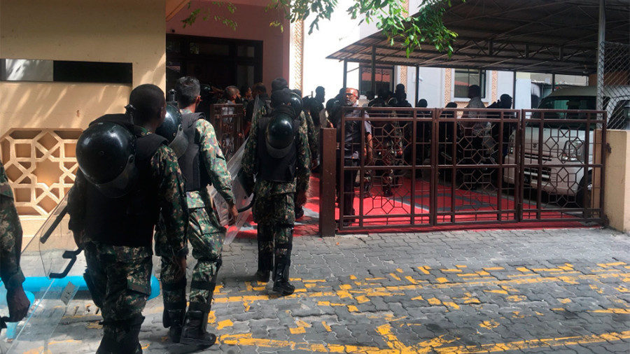 Security forces arrive at parliament in the Maldives