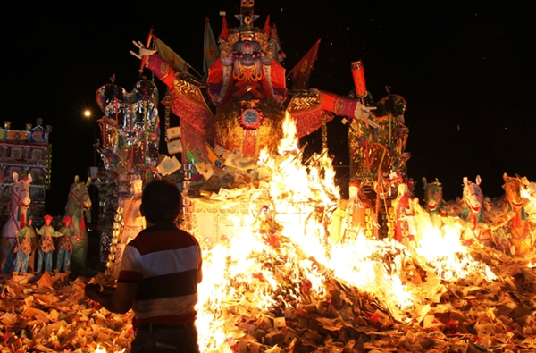 Burning paper offerings in Vietnam