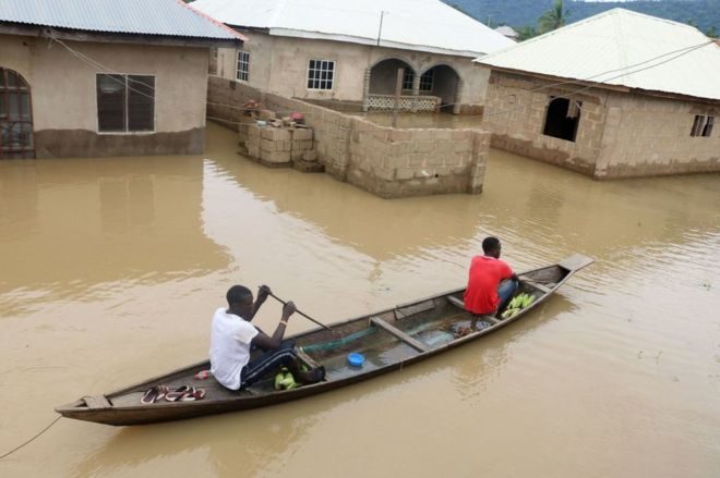 Residents paddle through of Lokoja town in Kogi State
