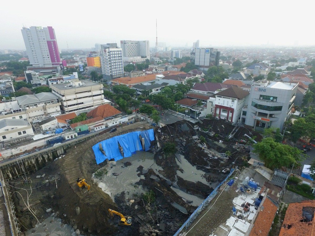 An aerial view of the sinkhole on Jl. Raya Gubeng