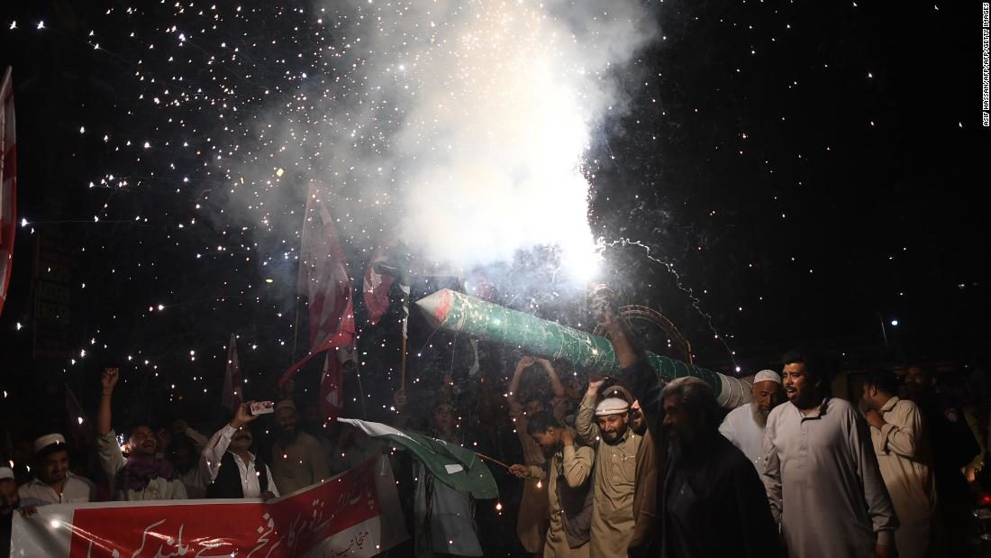 Pakistanis celebrate the Pakistan Air Force (PAF) for shooting down Indian fighter jets