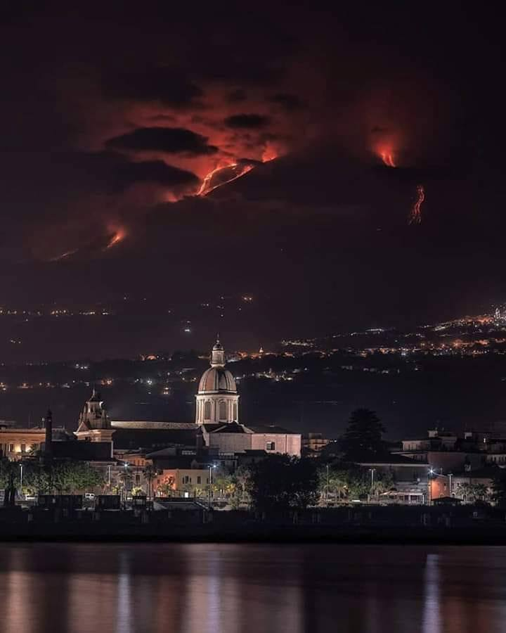 Etna in eruption above Riposto (CT), Sicily