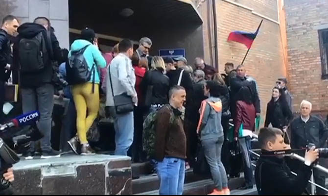 Donbass people queueing for Russian passports