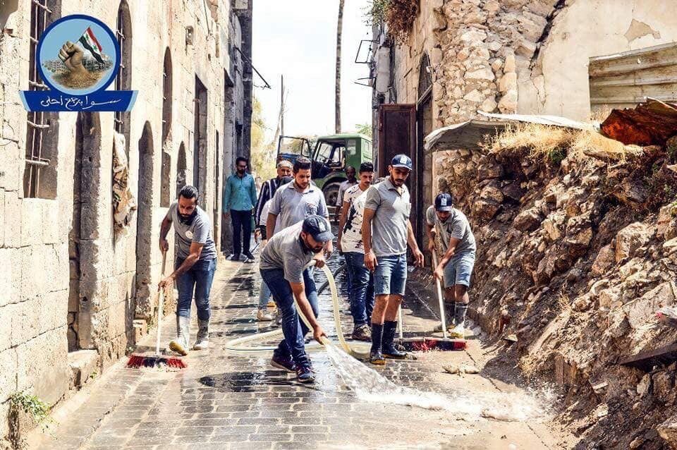 Syrians help restoring Aleppo